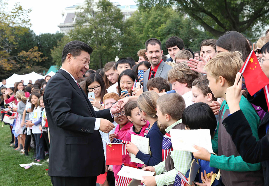 Obama welcomes Xi with <EM>nihao</EM> at elaborate White House ceremony