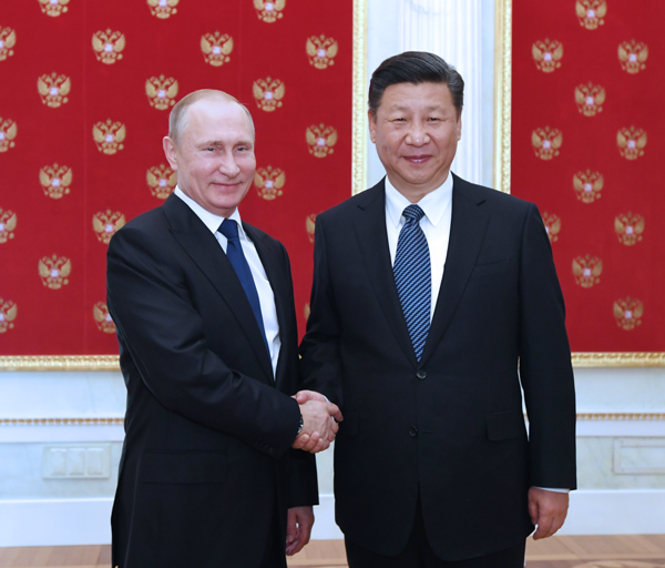 Xi, Putin agree to boost coordination on major issues