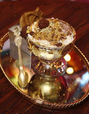 The Frrrozen Haute Chocolate is unveiled at the Serendipity-3 restaurant in New York Nov. 7, 2007 after Guiness World Records researchers determined the 25,000 U.S. dollars frozen hot chocolate was the most expensive dessert in the world.(Xinhua/Reuters Photo)