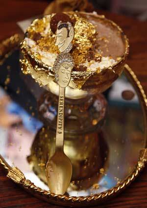 The Frrrozen Haute Chocolate is unveiled at the Serendipity-3 restaurant in New York Nov. 7, 2007 after Guinness World Records researchers determined the 25,000 U.S. dollars frozen hot chocolate was the most expensive dessert in the world.(Xinhua/Reuters Photo)