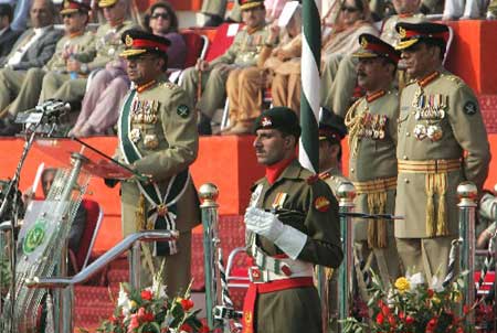 Pakistani new army chief General Ashfaq Kiyani (R) watches President General Pervez Musharraf deliver his speech during a change of command ceremony in Rawalpindi, Nov. 28, 2007. (Xinhua Photo)