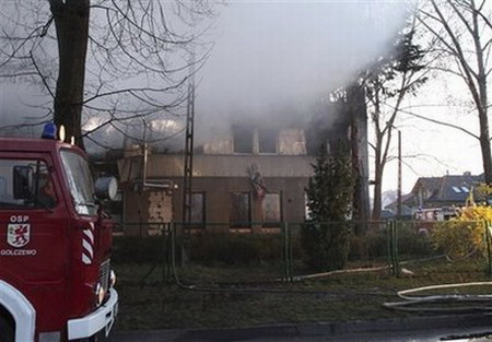 21 killed in Poland homeless shelter blaze