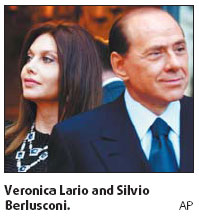 Wife upset with beauties and Berlusconi