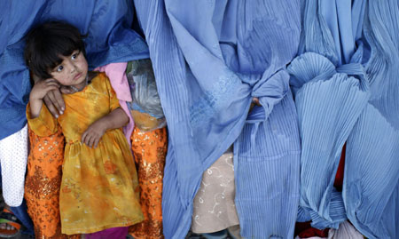 Displaced people at a repatriation centre in Pakistan
