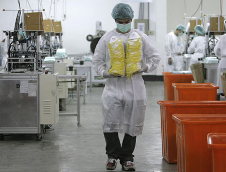 Masks production increased in Asia as flu spreads