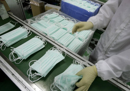 Masks production increased in Asia as flu spreads