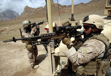 US Marines patrol Afghan mountainous district