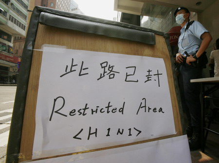 Travellers are quarantined in Hong Kong hotel