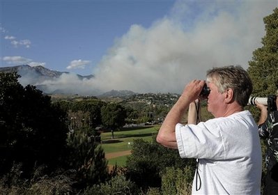 Wildfire burns homes in coastal Calif. enclave