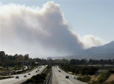 Wildfire burns homes in coastal Calif. enclave