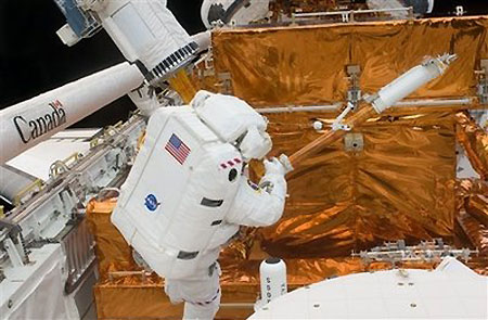 Spacewalkers pull off toughest Hubble repairs yet