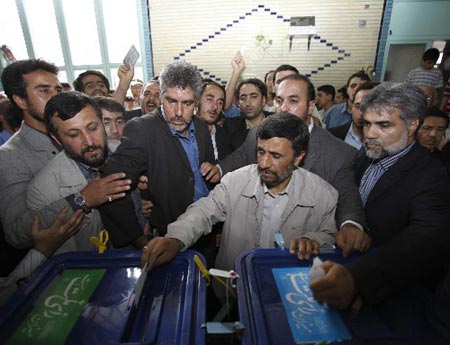 Iran's Ahmadinejad, rival both claim election win