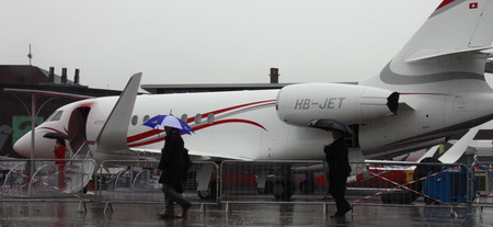 Rain glooms Paris Air Show