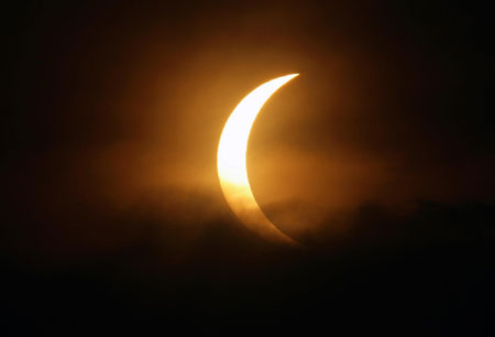 Longest 21st century solar eclipse envelops Asia in darkness