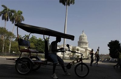 Cuba shuts factories, cuts energy to save economy