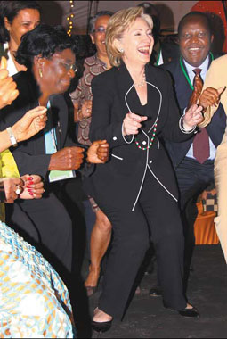 Clinton sets 'tough love' tone on Africa