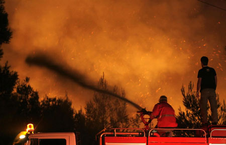 Dozens of wildfires reported in Greece