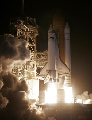 US shuttle Discovery lifts off after two delays