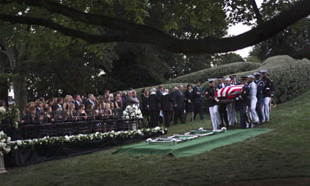 Kennedy carried to Arlington, laid beside brothers