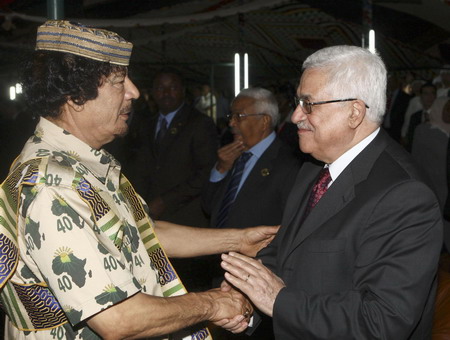 Hugs from Chavez as Gaddafi's Libya reaches 40