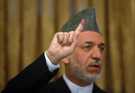 Karzai edges closer to 50% in Afghan vote