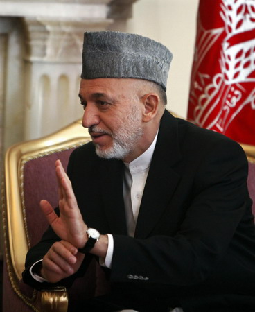 Afghan president defends vote, admits some bias