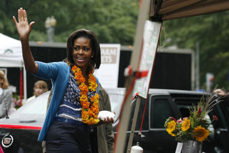 Michelle Obama attends market opening