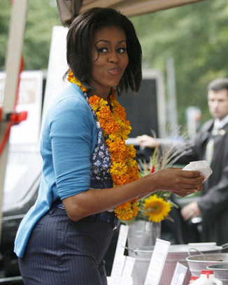 Michelle Obama attends market opening