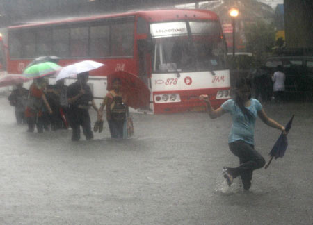 Tropical storm death toll rises to 51 in Philippines