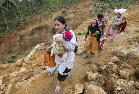 Village deaths to lift Indonesian quake death toll