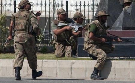 Bloody siege at Pakistan army HQ ends with 19 dead