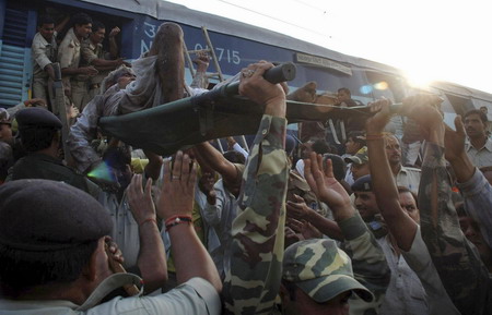 21 die as one train rams another in northern India