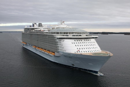 Largest cruise ship squeezes under Danish bridge