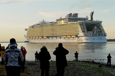 Largest cruise ship squeezes under Danish bridge