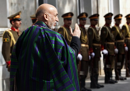 Obama backs Karzai, despite vote-rigging