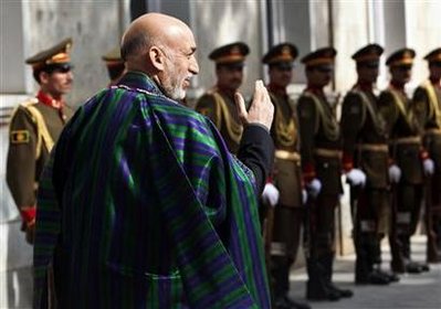 Afghan leader Karzai vows inclusive government