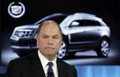 GM reports $1.2B loss, says it shows progress