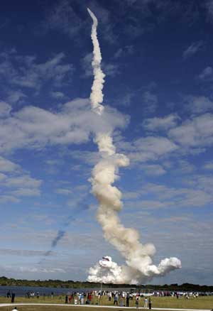 Space shuttle Atlantis lifts off on supply mission