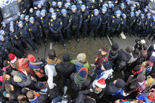 Police battle protesters at climate change conference