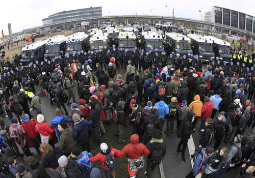 Police battle protesters at climate change conference