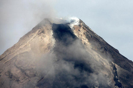 20,000 evacuated as Philippine volcano oozes lava