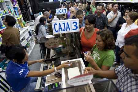 Venezuelans in shopping spree after devaluation