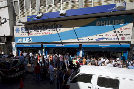 Venezuelans in shopping spree after devaluation