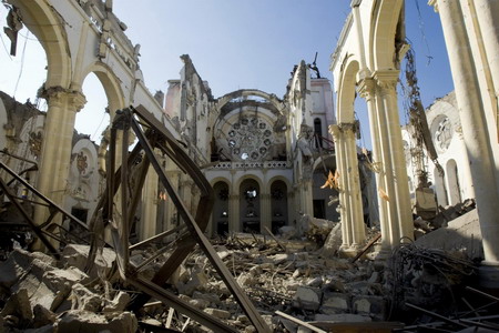 Haitians pray, cry for help in the ruins