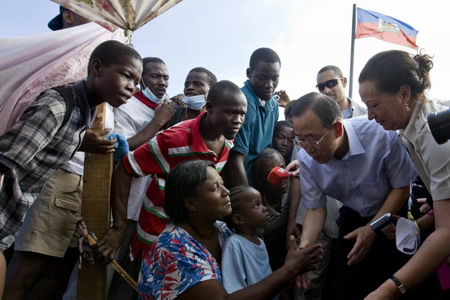 Haitians pray, cry for help in the ruins