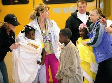 Americans rush to adopt orphaned Haitian children