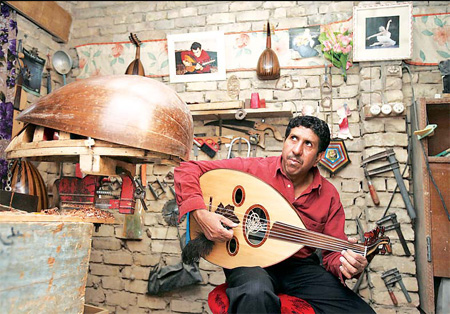 Musician creates quietly on his Baghdad rooftop