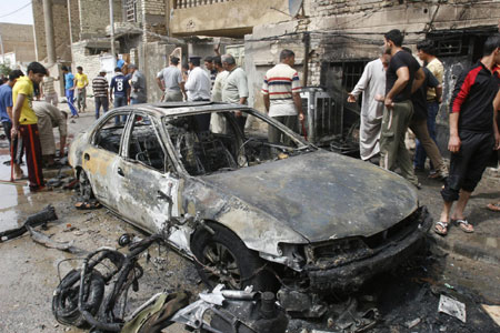 Death toll of Baghdad blasts rises to 52