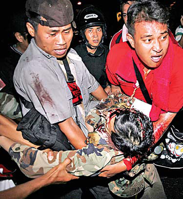 Bangkok tense as dissident general is shot