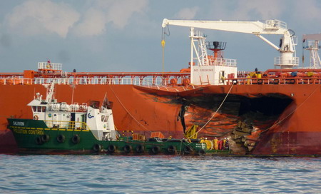 Oil spills off Singapore after tanker collision